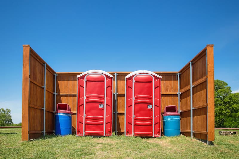 Short-term porta potty units staged for delivery in Paris, Texas